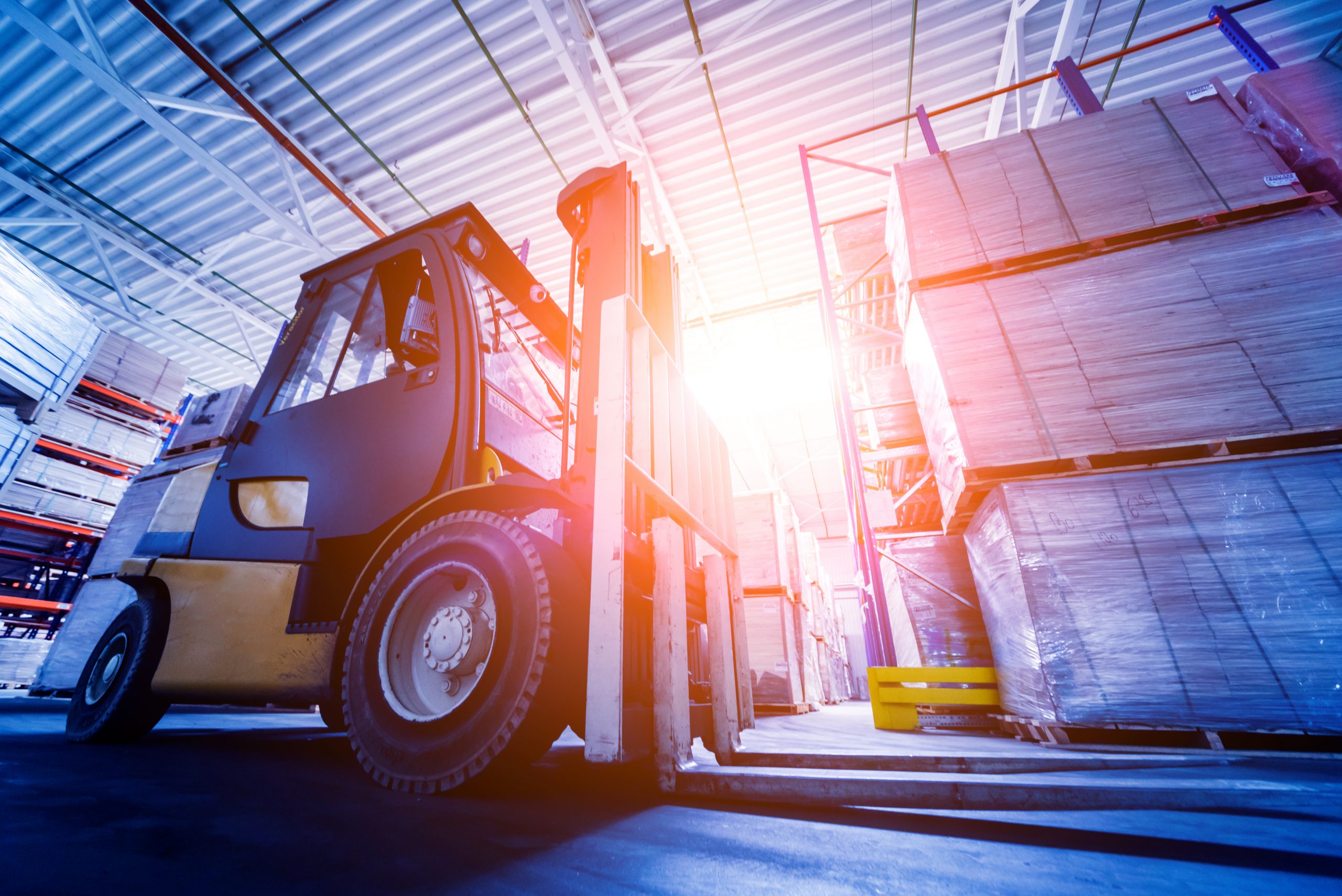 Forklift loader in storage warehouse ship yard. Distribution products. Delivery. Logistics. Transportation. Business background.